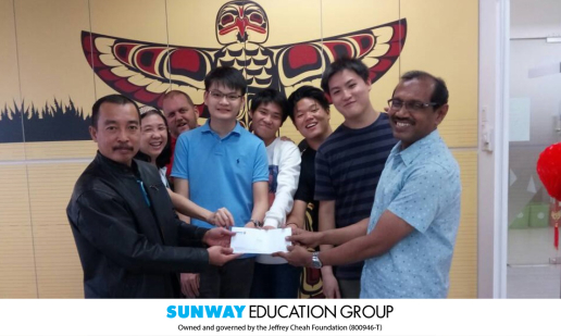 A cheque presentation of RM19,069 to the representative of Rumah Hope in March 2018